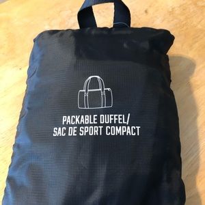 Pink Victoria Secret duffel bags.